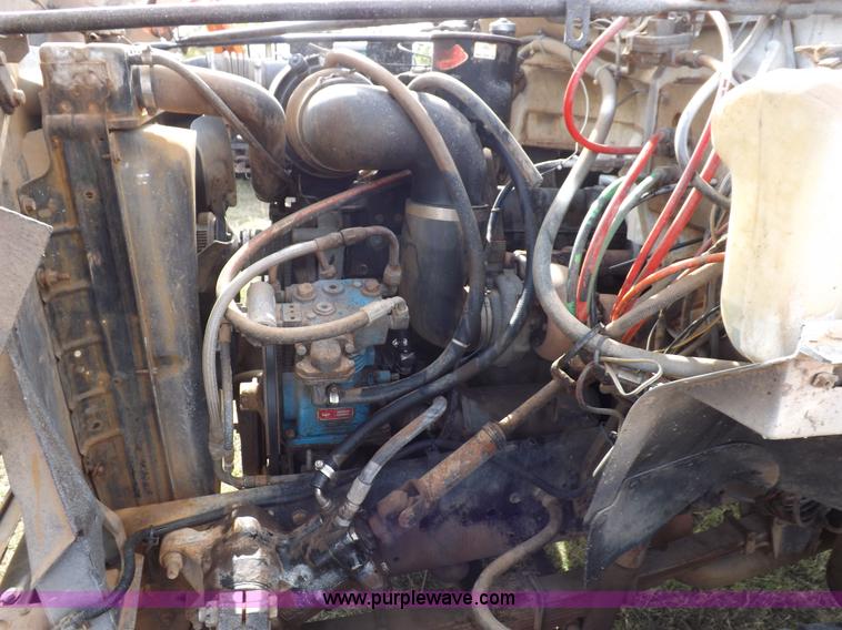 image for item H9004 1988 Ford F800 flatbed truck