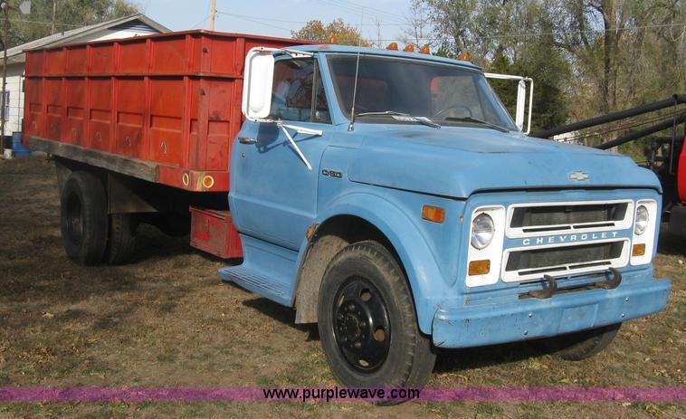 image for item H9371 1971 Chevrolet C50 stake bed dump truck