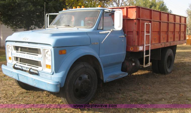 image for item H9371 1971 Chevrolet C50 stake bed dump truck