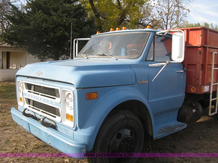 image for item H9371 1971 Chevrolet C50 stake bed dump truck
