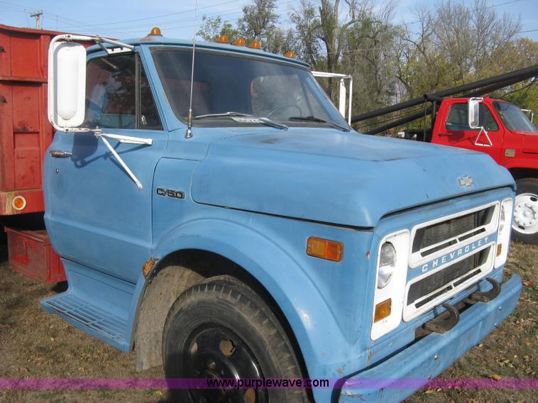 image for item H9371 1971 Chevrolet C50 stake bed dump truck