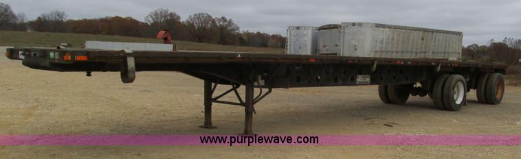 image for item I3186 1997 Transcraft TL2000 flatbed trailer