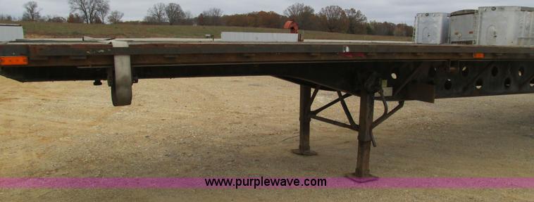 image for item I3186 1997 Transcraft TL2000 flatbed trailer