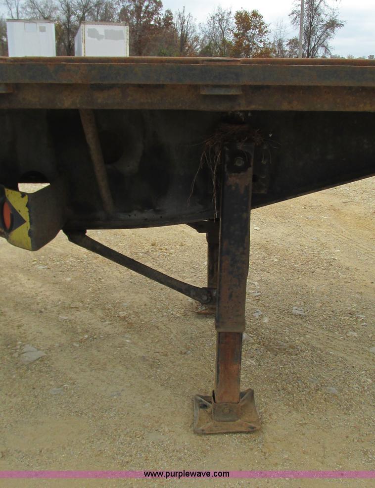 image for item I3186 1997 Transcraft TL2000 flatbed trailer