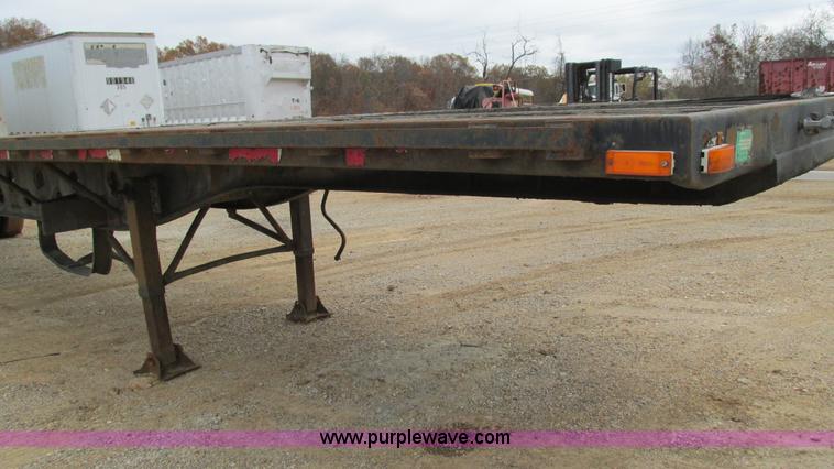 image for item I3187 1997 Transcraft TL2000 flatbed trailer
