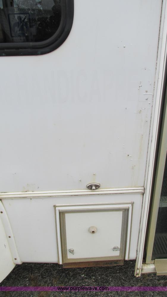 image for item I3194 2005 Ford F350 Goeshen coach bus