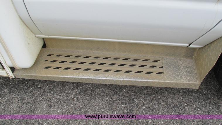 image for item I3194 2005 Ford F350 Goeshen coach bus