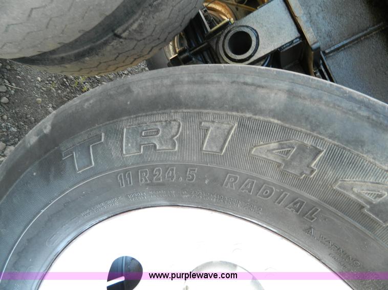 image for item H2437 1998 Travis T-102/27 end dump trailer