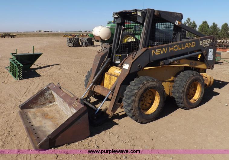 image for item H9011 1995 New Holland LX865 skid steer