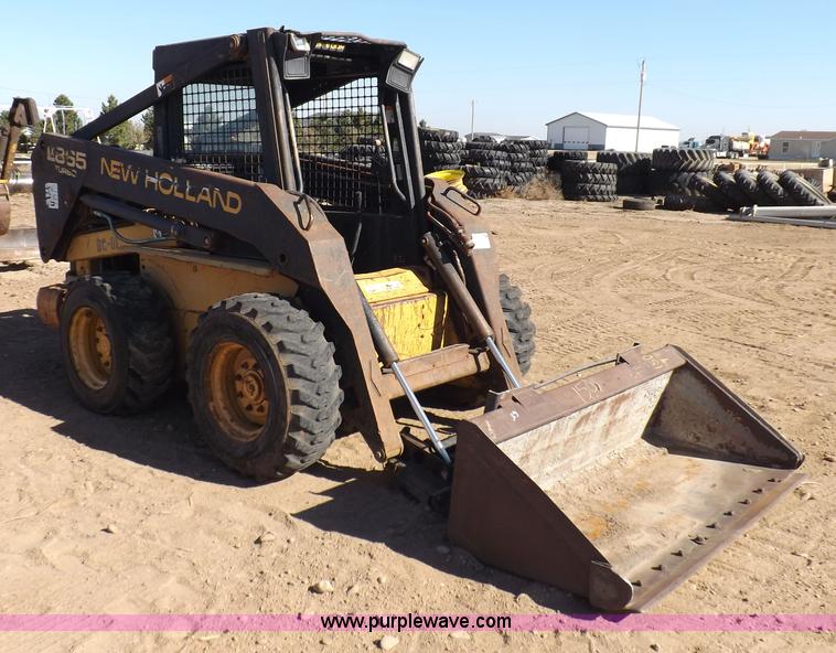 image for item H9011 1995 New Holland LX865 skid steer