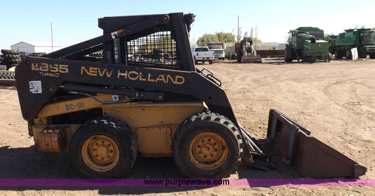 image for item H9011 1995 New Holland LX865 skid steer