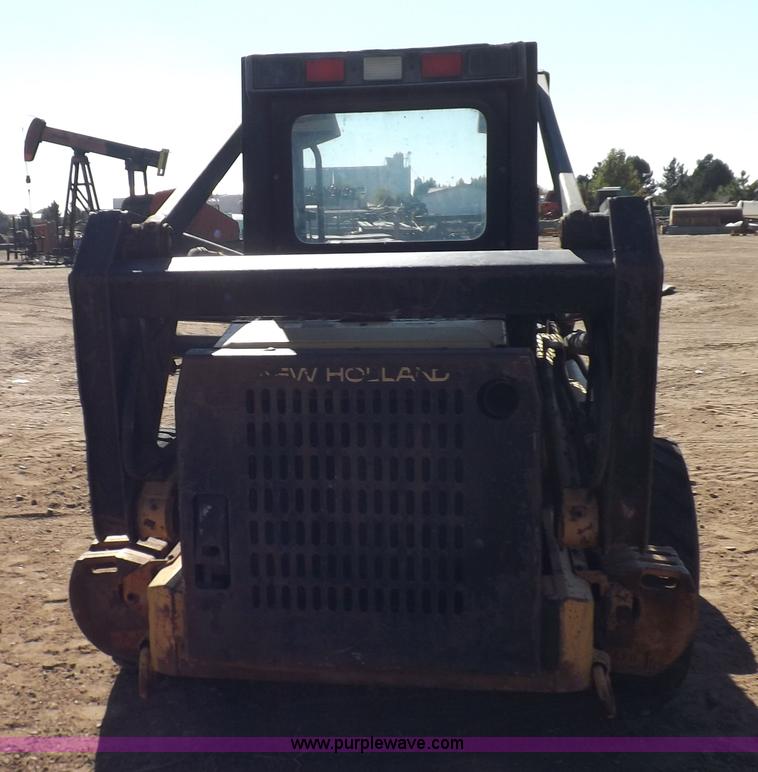 image for item H9011 1995 New Holland LX865 skid steer