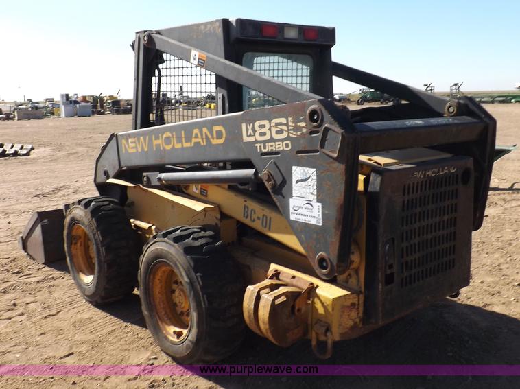 image for item H9011 1995 New Holland LX865 skid steer