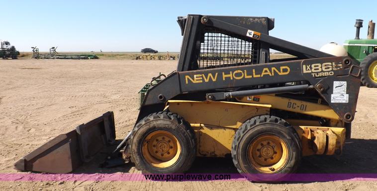 image for item H9011 1995 New Holland LX865 skid steer