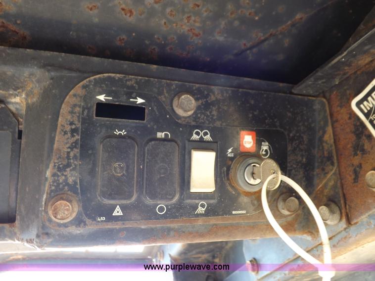 image for item H9011 1995 New Holland LX865 skid steer