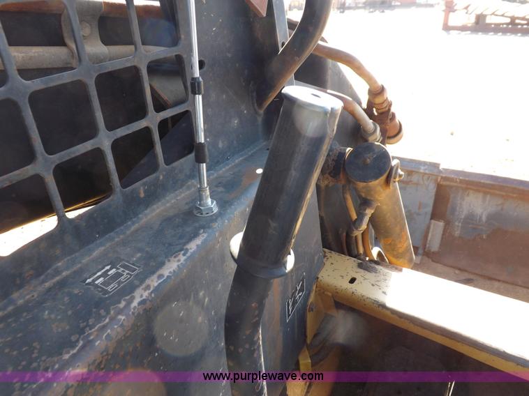 image for item H9011 1995 New Holland LX865 skid steer