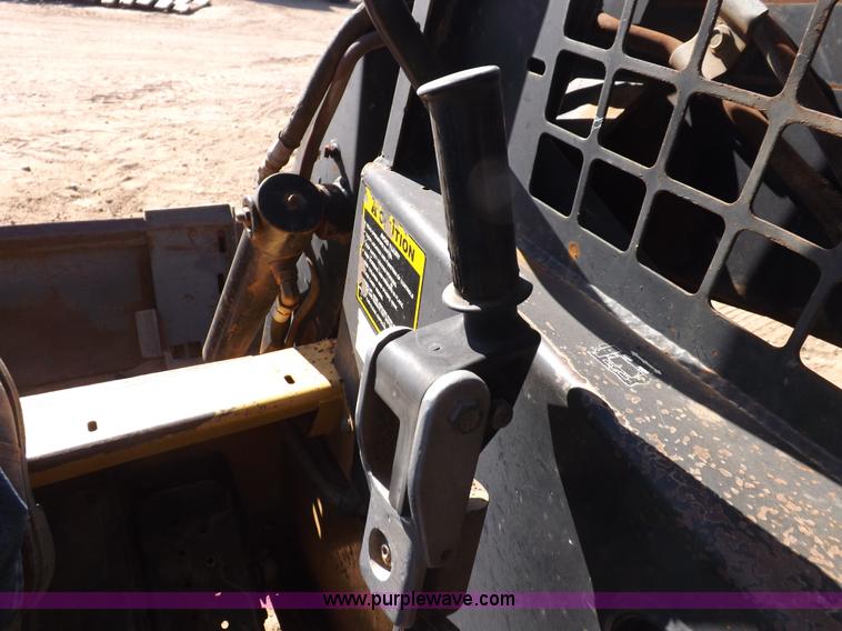 image for item H9011 1995 New Holland LX865 skid steer