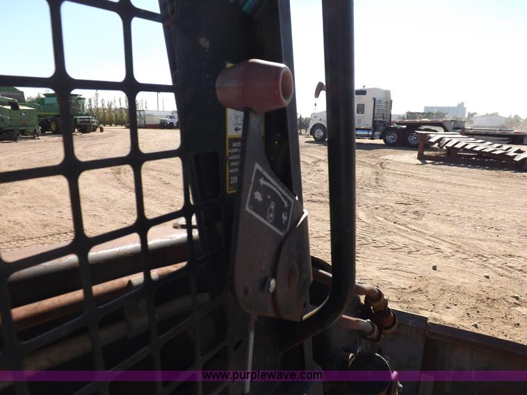 image for item H9011 1995 New Holland LX865 skid steer