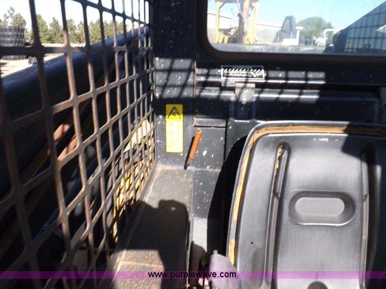 image for item H9011 1995 New Holland LX865 skid steer