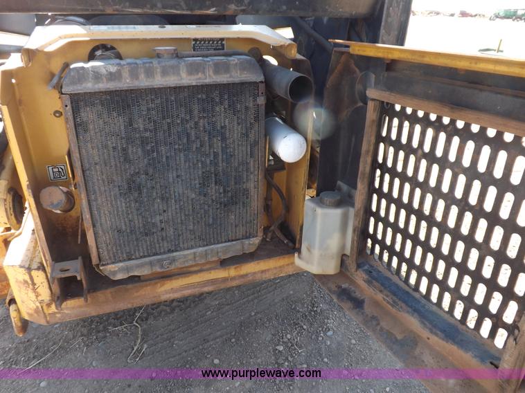 image for item H9011 1995 New Holland LX865 skid steer