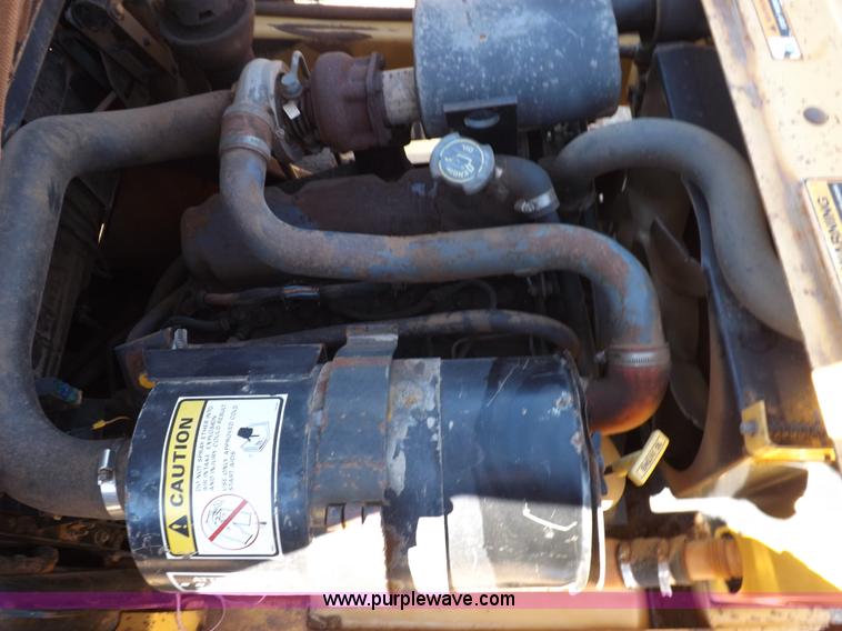 image for item H9011 1995 New Holland LX865 skid steer