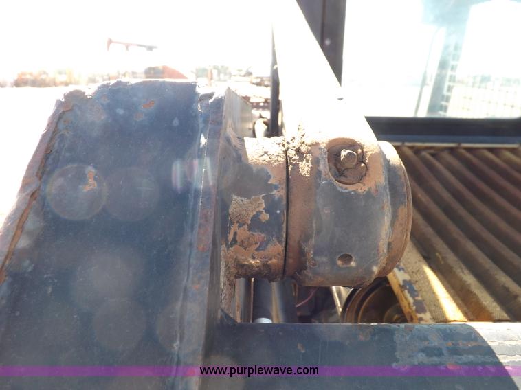 image for item H9011 1995 New Holland LX865 skid steer