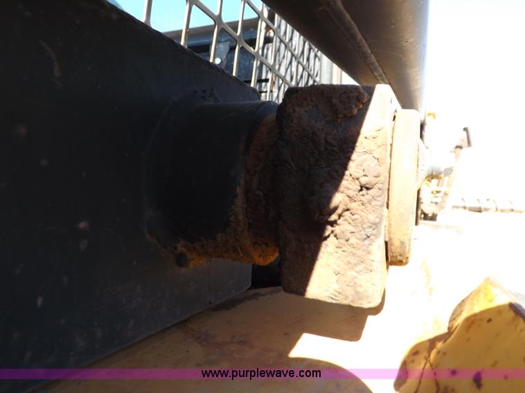 image for item H9011 1995 New Holland LX865 skid steer