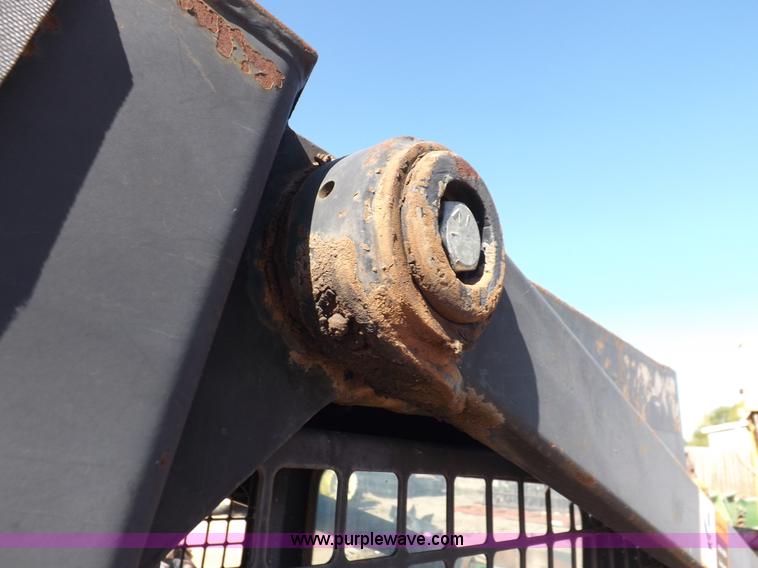 image for item H9011 1995 New Holland LX865 skid steer