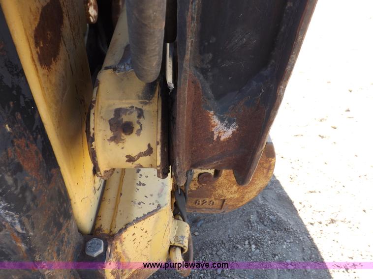 image for item H9011 1995 New Holland LX865 skid steer