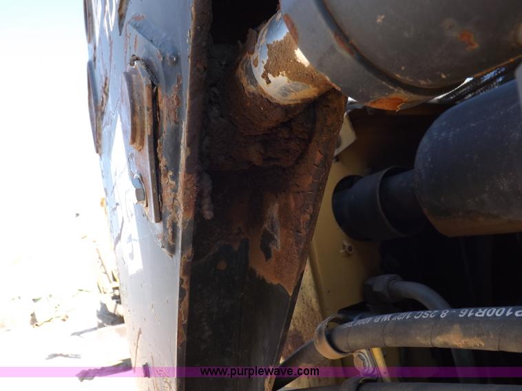 image for item H9011 1995 New Holland LX865 skid steer