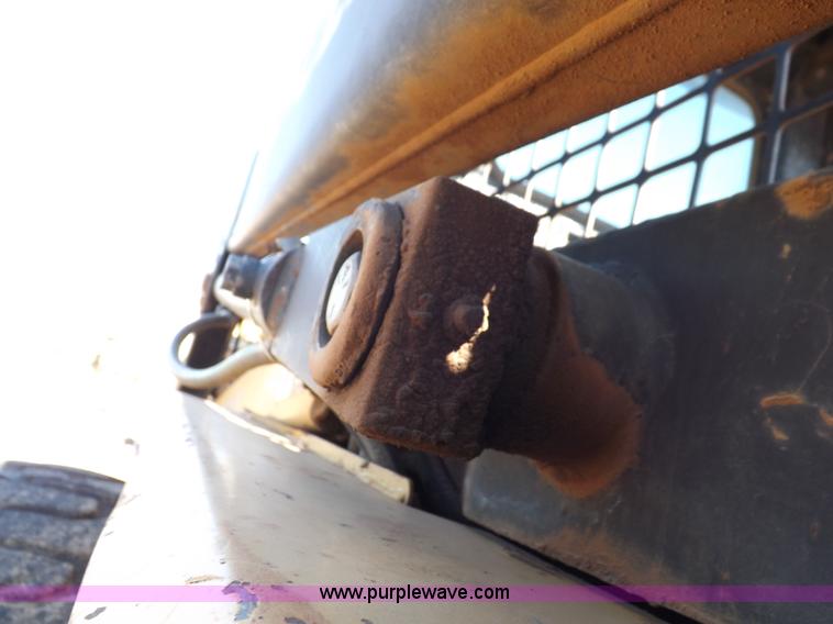 image for item H9011 1995 New Holland LX865 skid steer