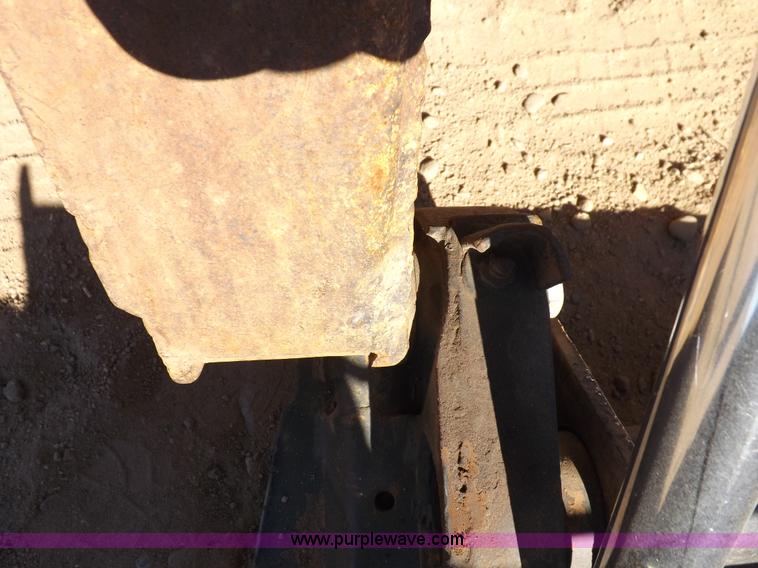 image for item H9011 1995 New Holland LX865 skid steer