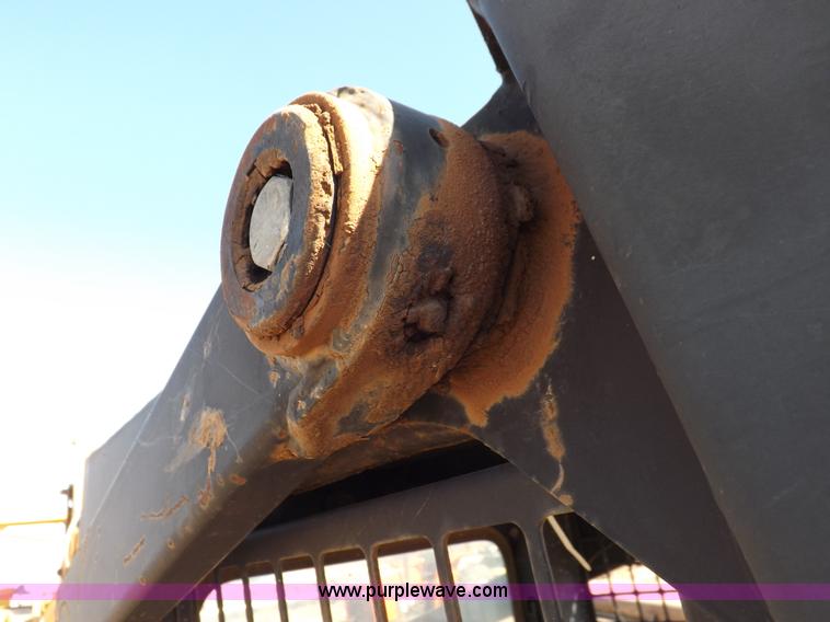 image for item H9011 1995 New Holland LX865 skid steer