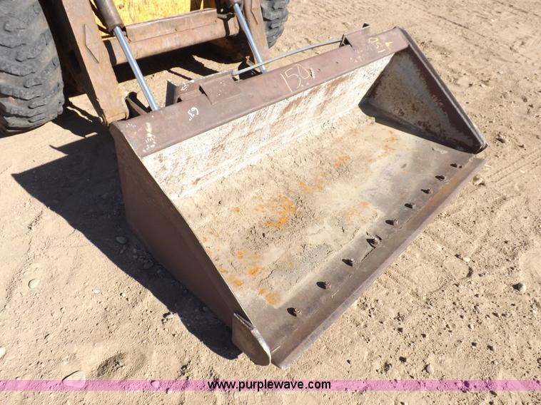 image for item H9011 1995 New Holland LX865 skid steer