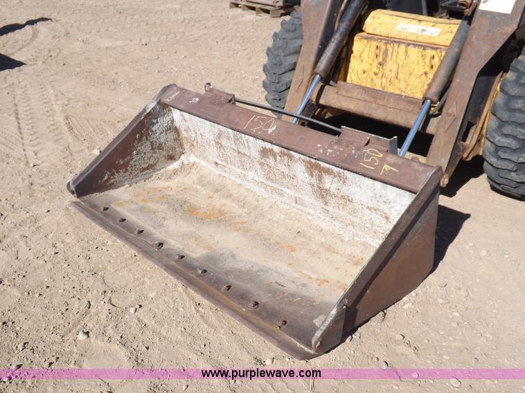 image for item H9011 1995 New Holland LX865 skid steer