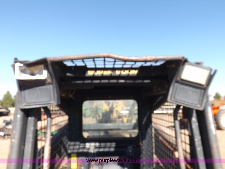 image for item H9011 1995 New Holland LX865 skid steer