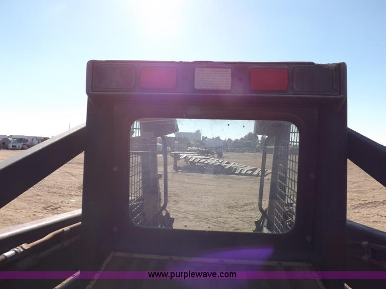 image for item H9011 1995 New Holland LX865 skid steer