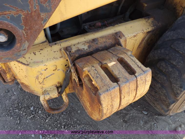 image for item H9011 1995 New Holland LX865 skid steer