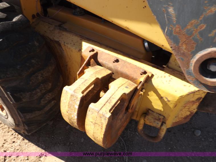 image for item H9011 1995 New Holland LX865 skid steer