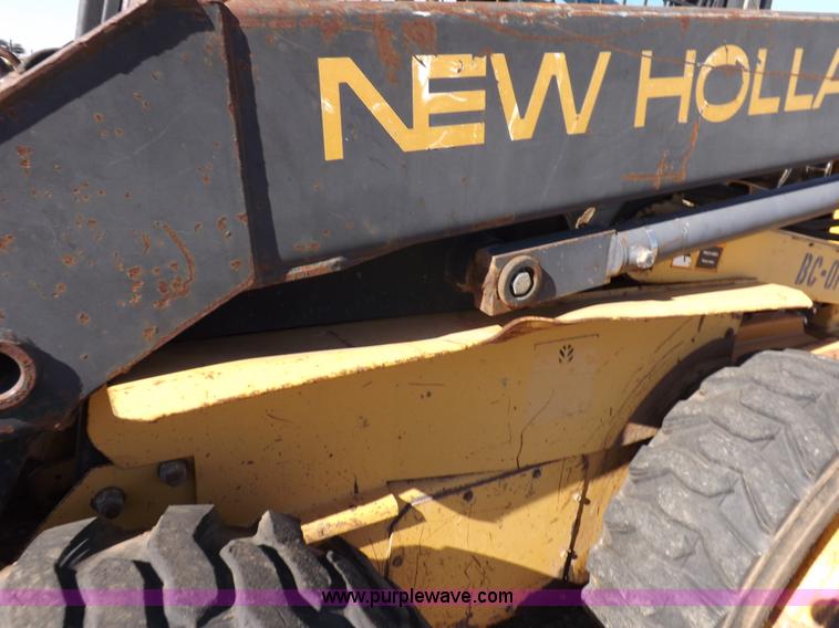 image for item H9011 1995 New Holland LX865 skid steer
