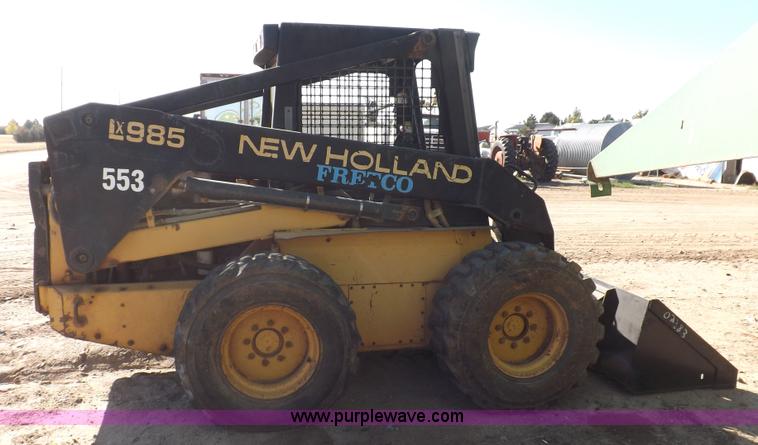 image for item H9012 1999 New Holland LX985 skid steer