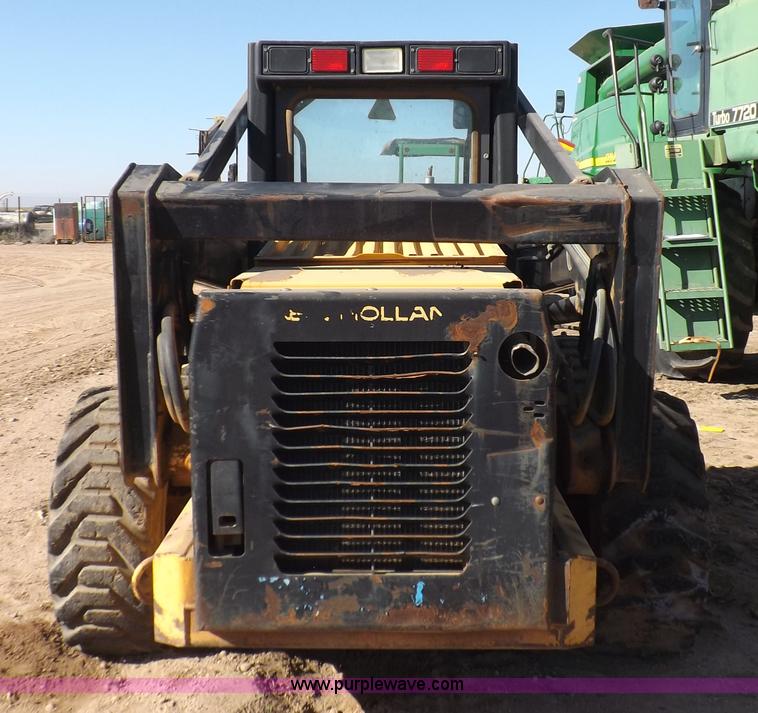image for item H9012 1999 New Holland LX985 skid steer
