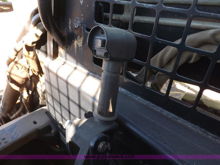 image for item H9012 1999 New Holland LX985 skid steer