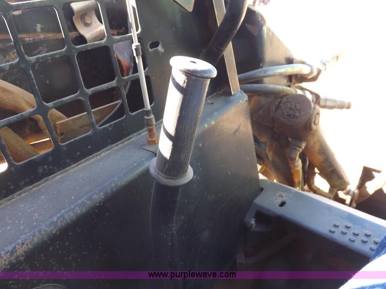 image for item H9012 1999 New Holland LX985 skid steer