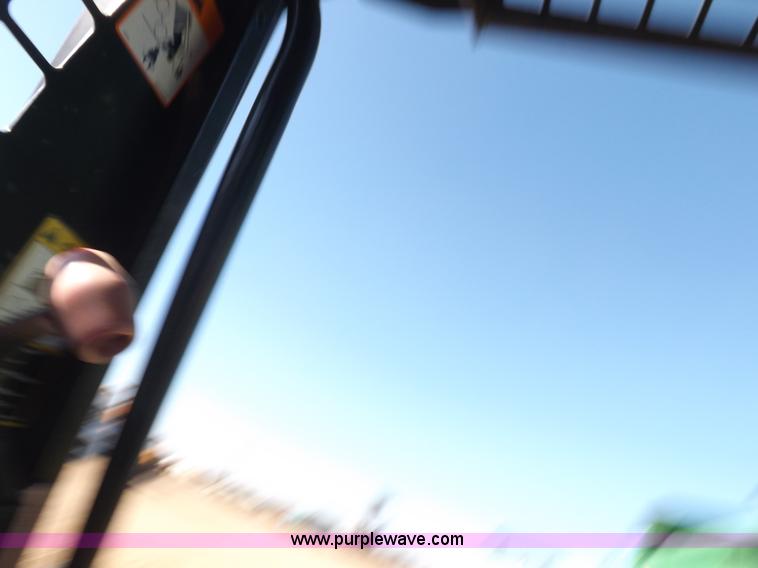 image for item H9012 1999 New Holland LX985 skid steer