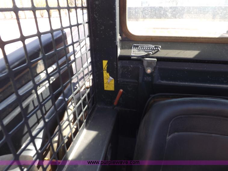 image for item H9012 1999 New Holland LX985 skid steer