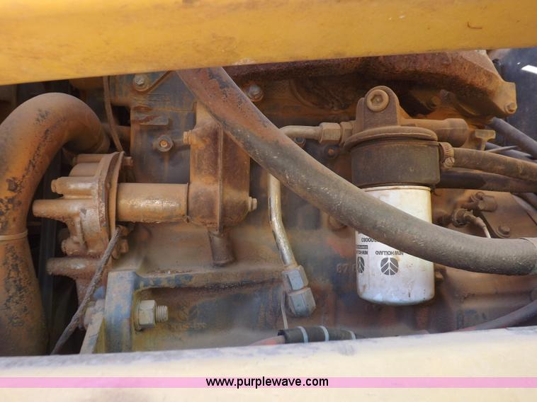 image for item H9012 1999 New Holland LX985 skid steer