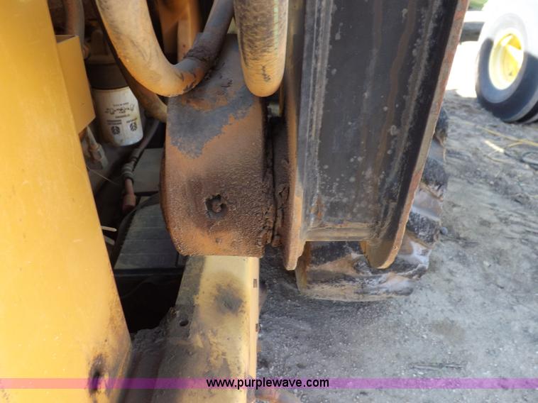 image for item H9012 1999 New Holland LX985 skid steer