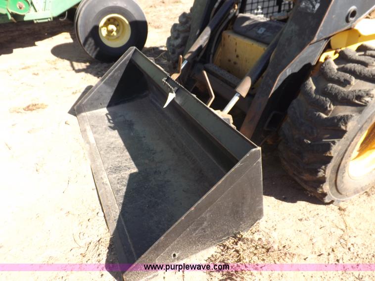 image for item H9012 1999 New Holland LX985 skid steer