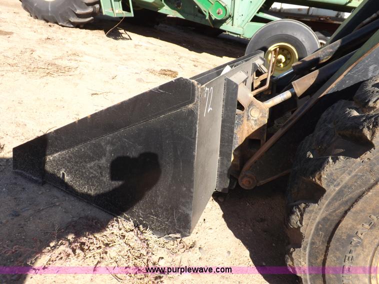 image for item H9012 1999 New Holland LX985 skid steer